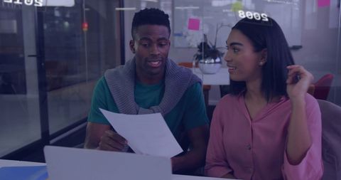 Collaborating Business Professionals Discussing Project at Office