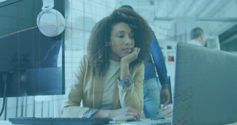 Thoughtful Businesswoman Analyzing Statistical Data in Modern Office