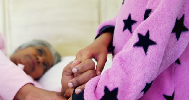 Child Holding Hands with Elderly Woman in a Hospital - Download Free Stock Images Pikwizard.com