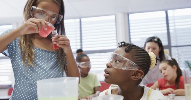 Diverse school children doing expeiments during science lesson at school - Download Free Stock Photos Pikwizard.com