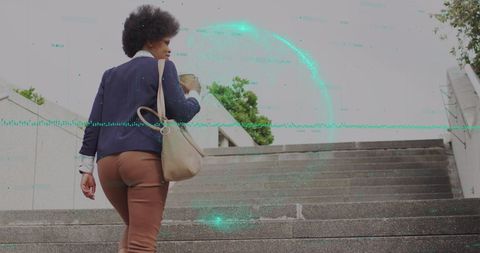 Stylish Businesswoman Analyzing Data on Globe Projection