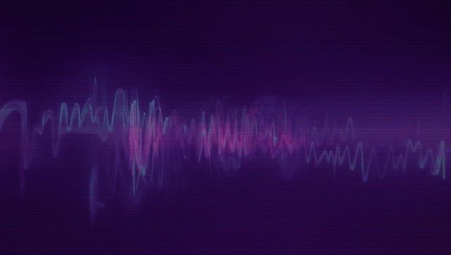 Futuristic neon audio waveform display on retro screen