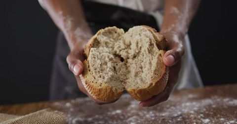 Baker Holding Freshly Baked Artisan Bread - Download Free Stock Images Pikwizard.com