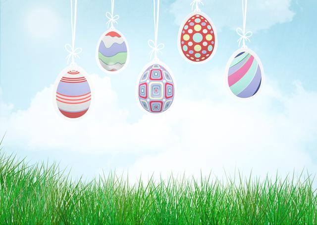 Digital composite of Easter eggs hanging.