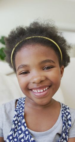 Joyful african american girl smiling