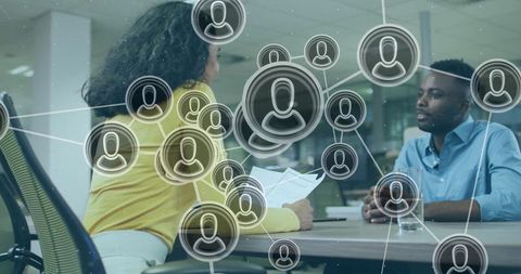 Job interview with networking concept overlay in modern office