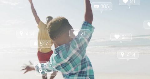 Children running toward ocean on sunny beach with social media icons overlay