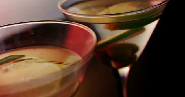 Citrus-Infused Martini Glasses in Moody Lighting - Download Free Stock Images Pikwizard.com