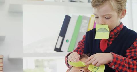 Children having fun with sticky notes in office environment - Download Free Stock Images Pikwizard.com