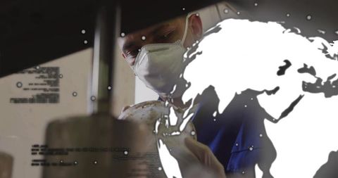 Scientist inspecting sample with precision press wearing PPE and global map overlay