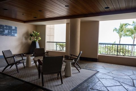 Outdoor Lounge Area Overlooking Ocean with Palm Trees