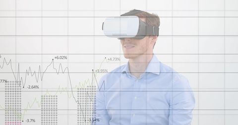 Businessman Analyzing Financial Charts with VR Headset Technology - Download Free Stock Images Pikwizard.com