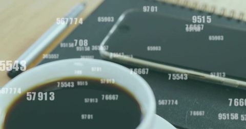 Coffee cup and smartphone with numeric data overlays for fintech, analytics, productivity