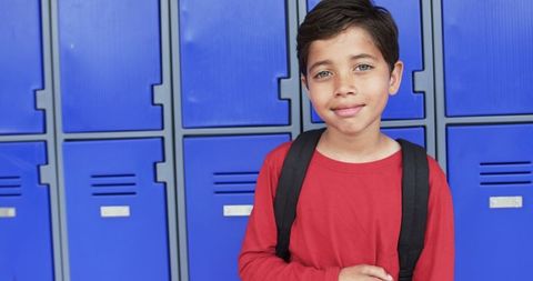 Confident Young Student Posing by School Lockers - Download Free Stock Images Pikwizard.com
