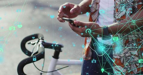 African American Man Engages with Smartphone Amidst Digital Icons