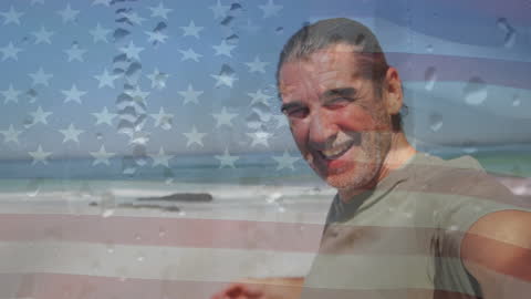 American Patriotism with Smiling Senior at Beach
