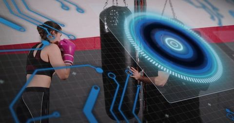 Woman boxing training with augmented reality hud, wearable analytics and smart coaching