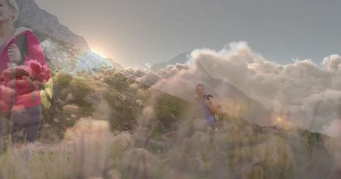 Couple Trekking in Mountainous Landscape with Majestic Clouds