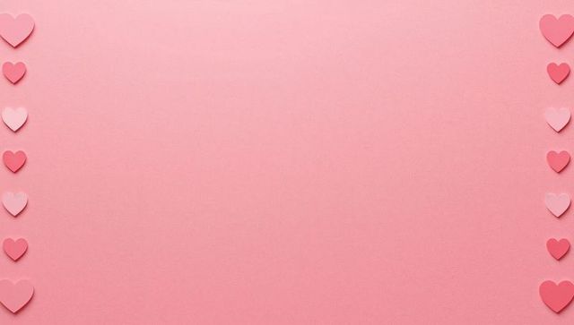 Pastel pink cardstock creating symmetrical heart border and negative space for romantic design