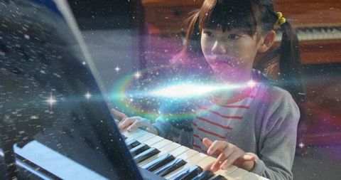 Young girl practicing piano with cosmic galaxy overlay and dreamy sparkle
