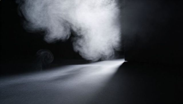 Moody drift of thick smoke plume under narrow slit light casting diagonal shadow and mist