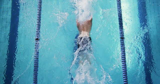 Swimmer Practicing Backstroke in Pool with Clear Blue Water - Download Free Stock Images Pikwizard.com