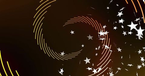 Yellow-orange spiral rings glowing with drifting stars and kinetic particle motion