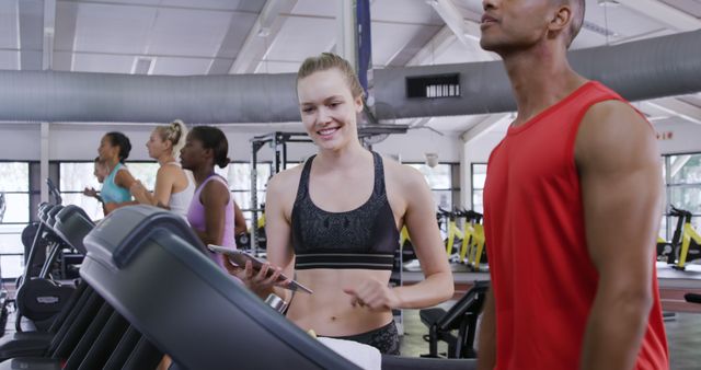 Individuals Exercising on Treadmills in Modern Gym - Download Free Stock Images Pikwizard.com