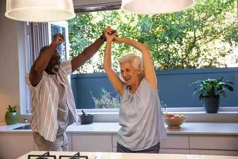 Senior Couple Breakfast Dance in Sunny Kitchen Launches a Day of Joy