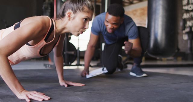 Personal Trainer Coaching Woman During Push-Up - Download Free Stock Images Pikwizard.com