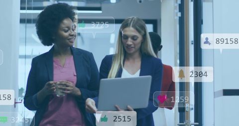 Business Professionals Analyzing Social Media Data in Office