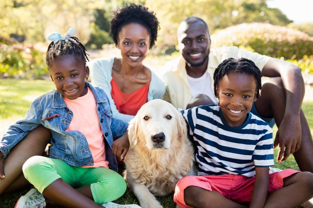Happy African American Family with Dog at Park - Download Free Stock Photos Pikwizard.com