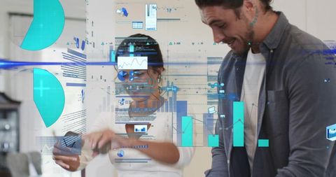 Professionals analyzing holographic analytics dashboard on mobile and laptop in workspace