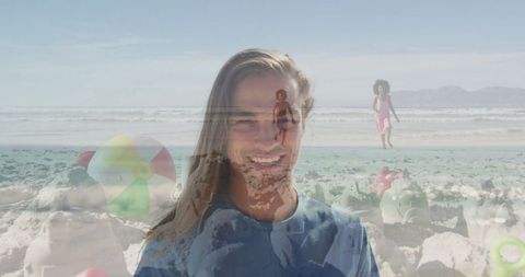Father Enjoying Family Time While Children Play on Beach