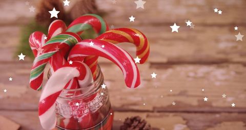 Festive Candy Canes in Jar with Glittering Overlay - Download Free Stock Images Pikwizard.com