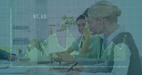 Team Analyzing Projected Trends with Digital Technology