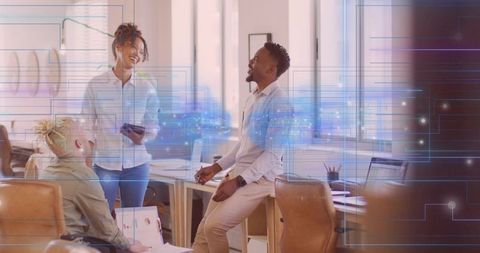 Diverse Modern Office Collaboration with Digital Overlay