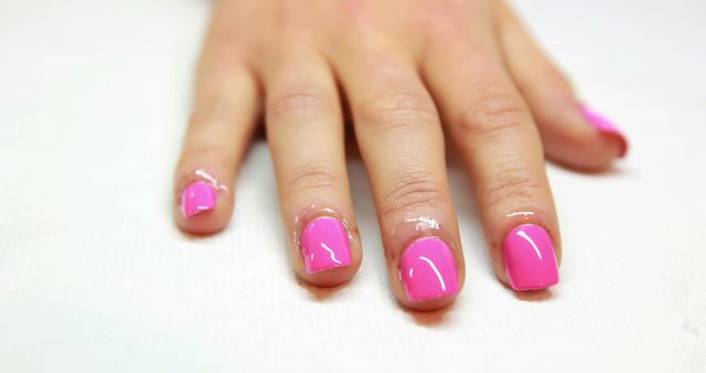 Close-up of hands with freshly painted pink nails - Download Free Stock Images Pikwizard.com