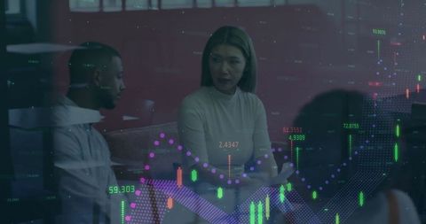 Colleagues Analyzing Market Trends with Holographic Charts