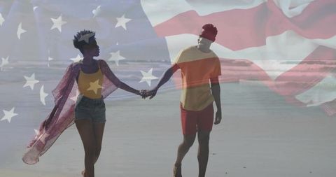 Romantic couple walking on beach with american flag overlay