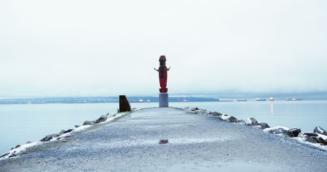 Winter Scene with Coastal Statue on Jetty - Download Free Stock Images Pikwizard.com