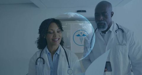 Medical team reviewing patient records with holographic globe overlay for global health