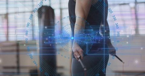Midadult woman training with jump rope in gym with futuristic hud fitness data overlay