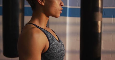 Focused Female Boxer Pausing During Intense Training Session - Download Free Stock Images Pikwizard.com