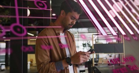 Businessman Analyzing Digital Financial Data on Smartphone in Modern Office