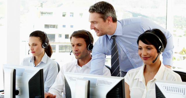 Customer Service Team with Manager Overseeing Work - Download Free Stock Images Pikwizard.com