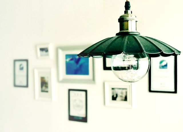 Vintage Hanging Light with Frame Decor on White Wall - Download Free Stock Photos Pikwizard.com