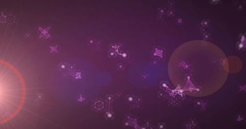Pulsing purple geometric particles with orange halo and lens flare, futuristic holographic