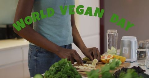 African American Woman Preparing Vegetables for World Vegan Day Celebration