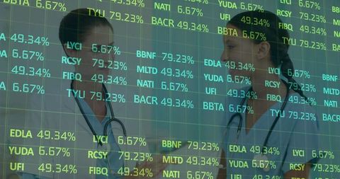 Nurses Collaborating with Digital Data Overlay in Healthcare Setting